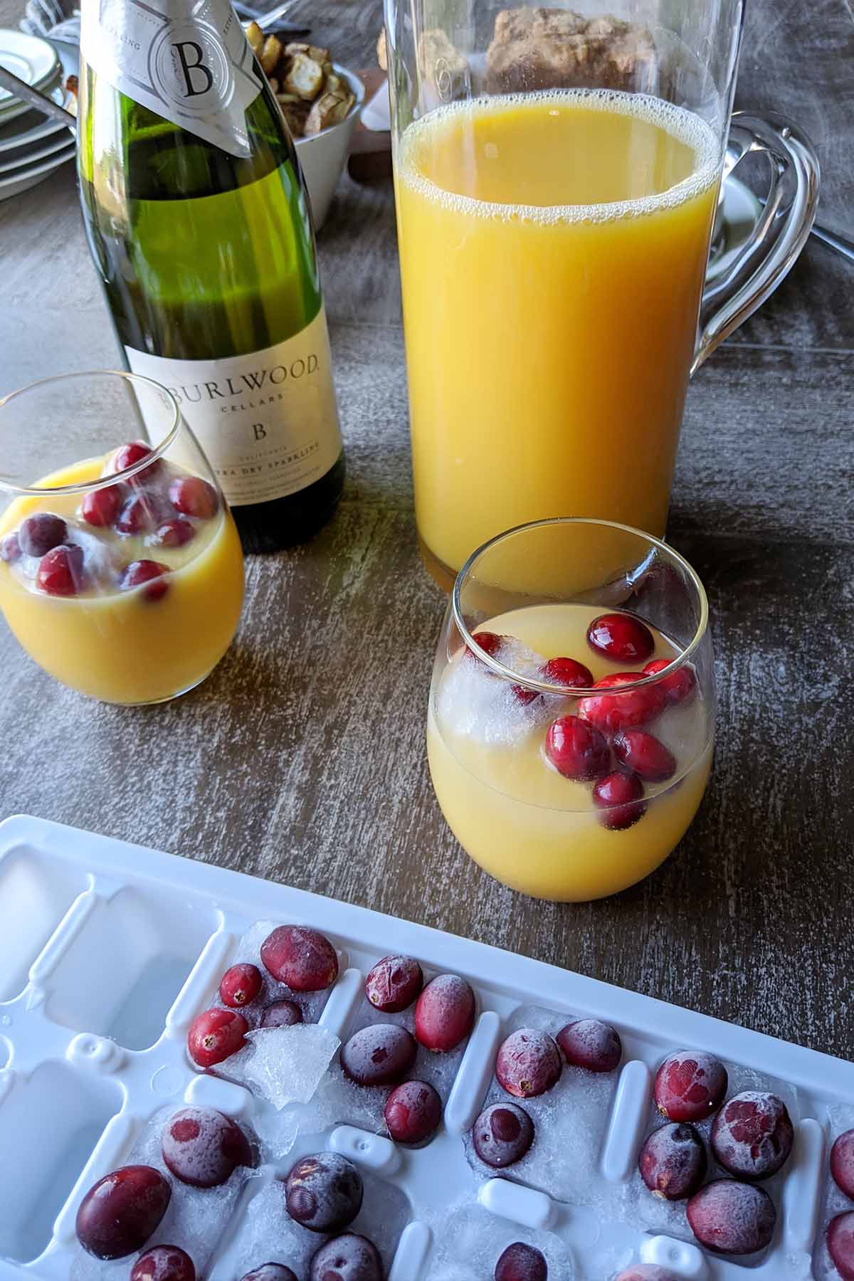 mimosa with cranberry ice cubes