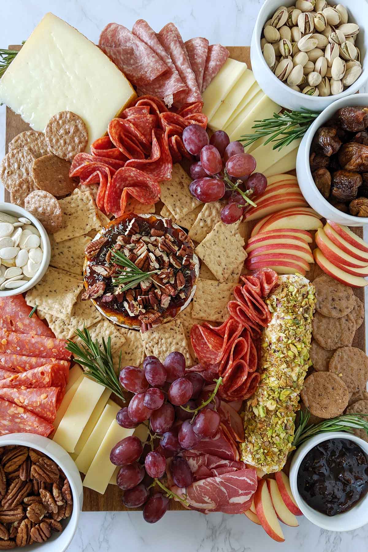 fall cheese platter with various accoutrements.