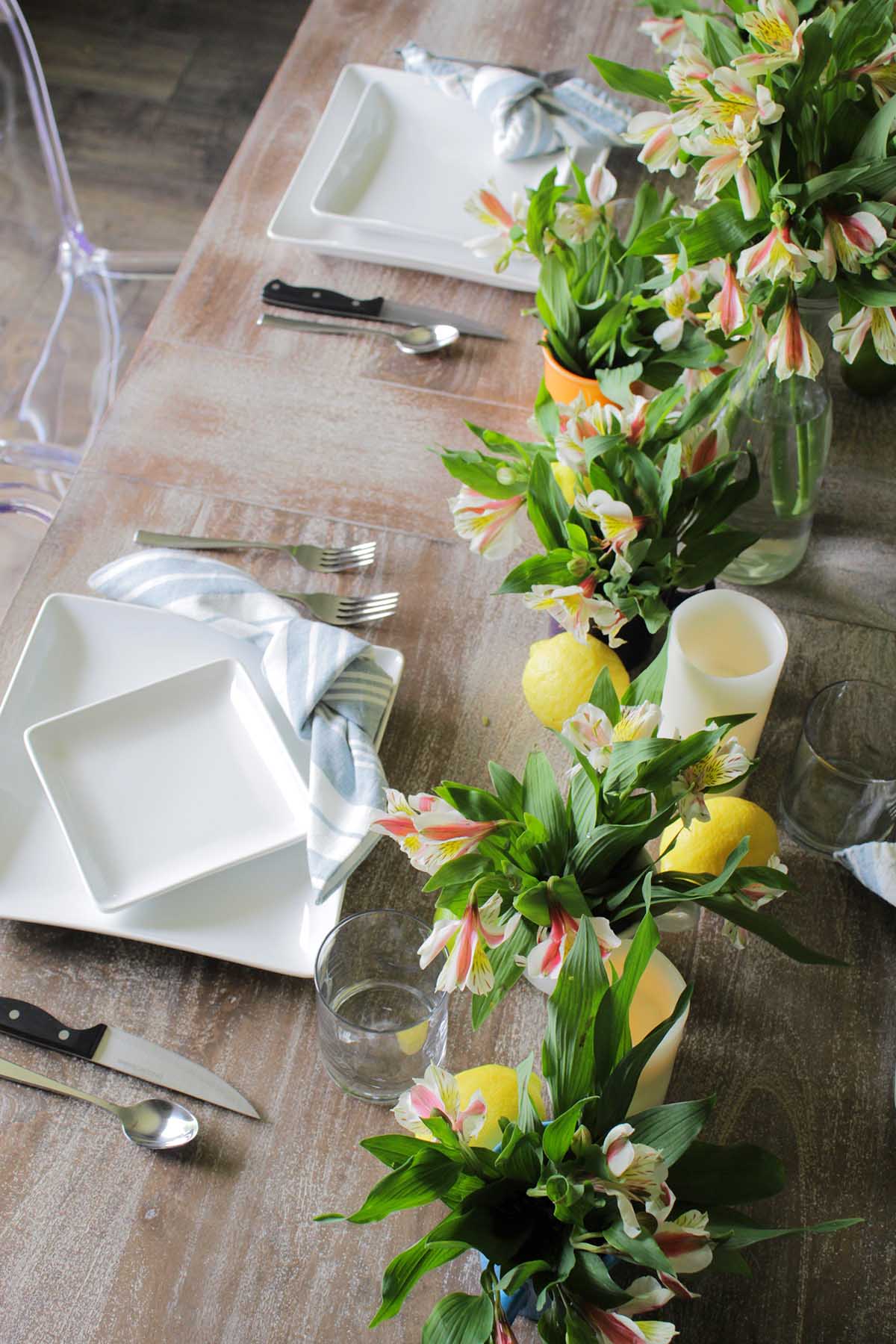 summer tablescape with flowers and candles