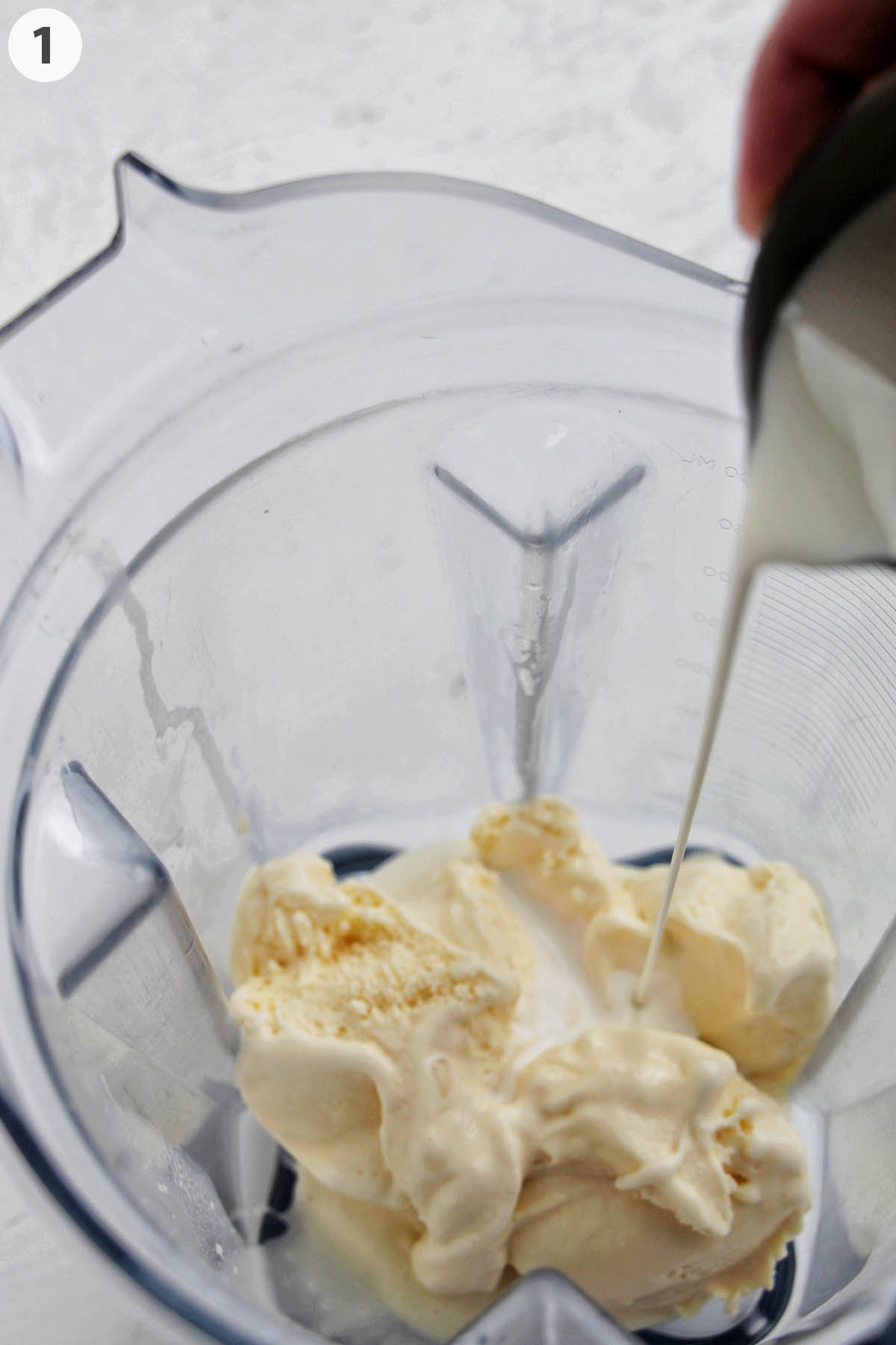 numbered photo of ice cream and cream in a blender.