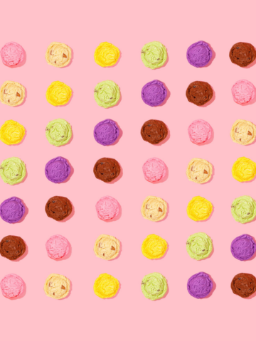 various ice cream flavors on pink background.