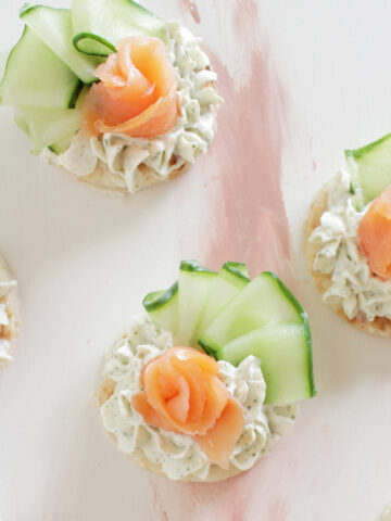 canapes with smoked salmon rose and cucumber.