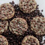 espresso chocolate chip cookies on coffee beans.