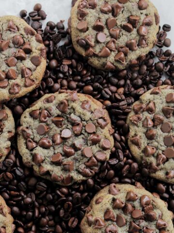 espresso chocolate chip cookies on coffee beans.