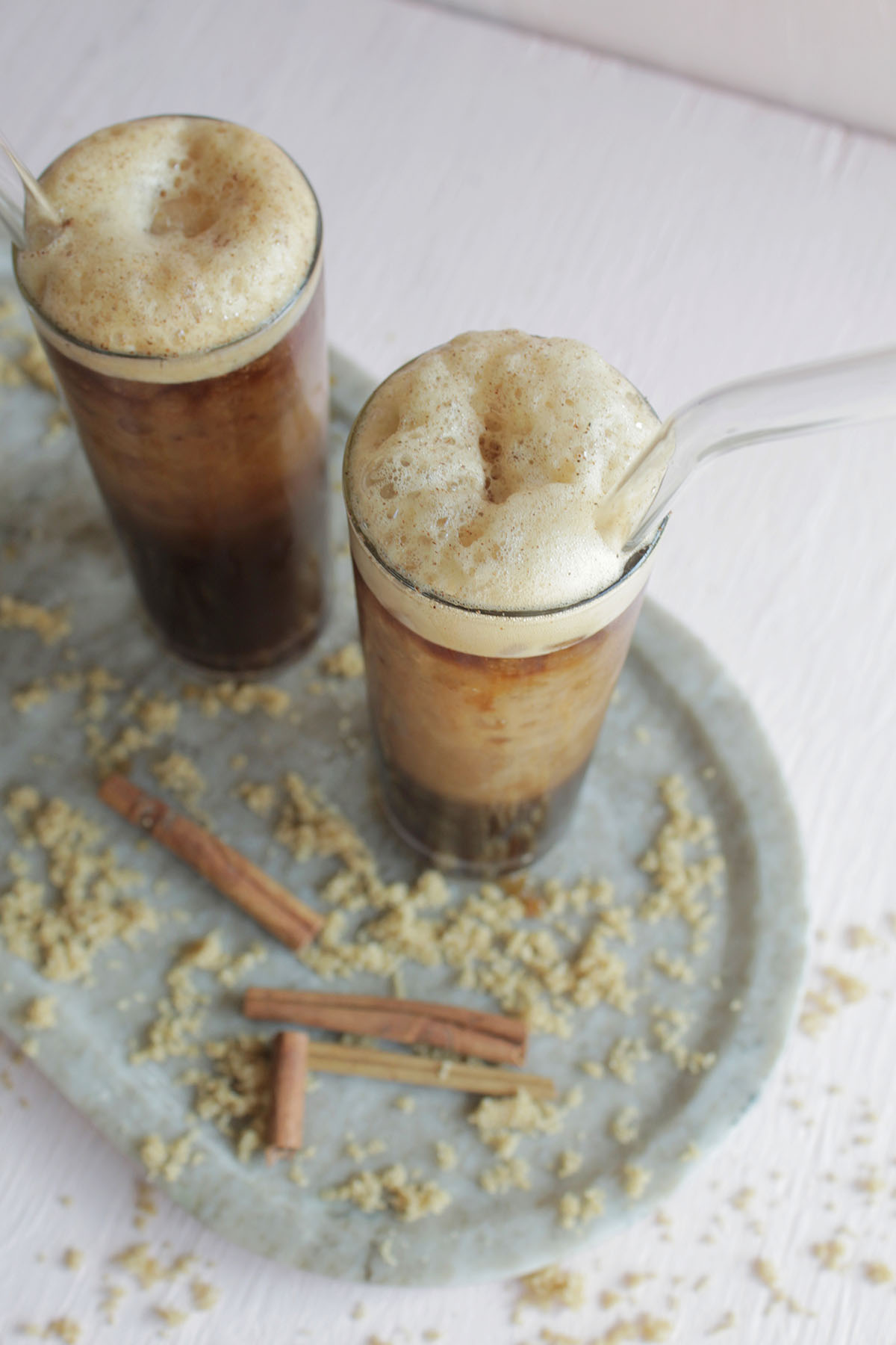 brown sugar oat milk shaken espresso in glass cup.