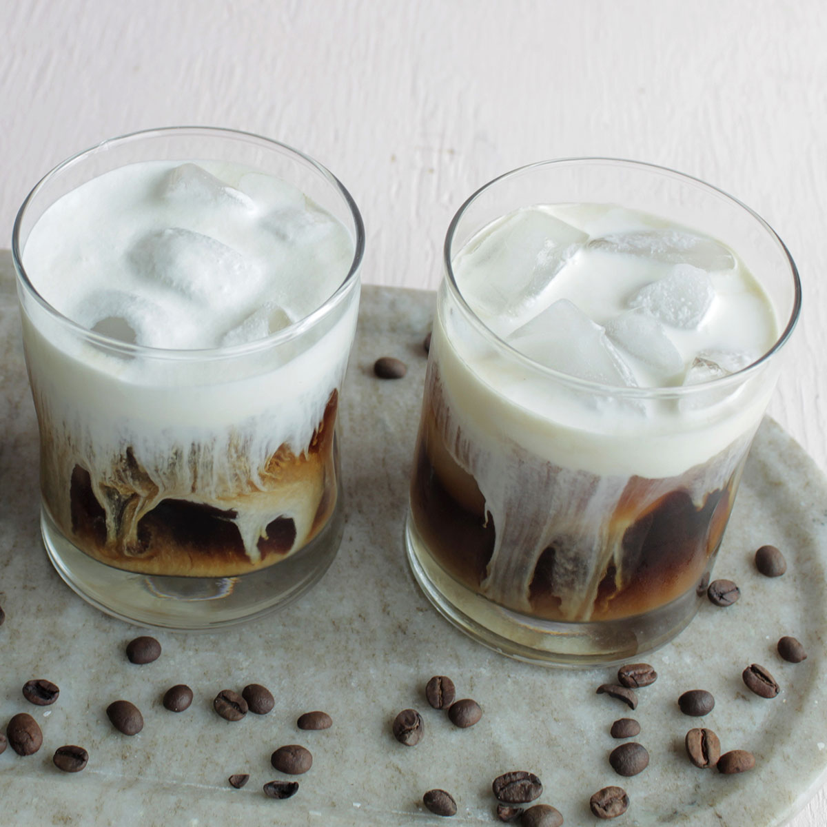 https://homebodyeats.com/wp-content/uploads/2021/10/how-to-make-cold-foam-on-coffee.jpg