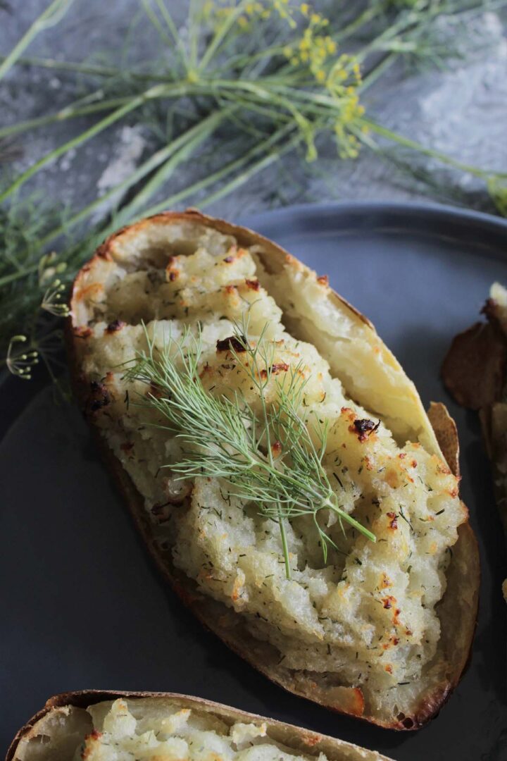 twice baked potatoes with flecks of garlic and dill