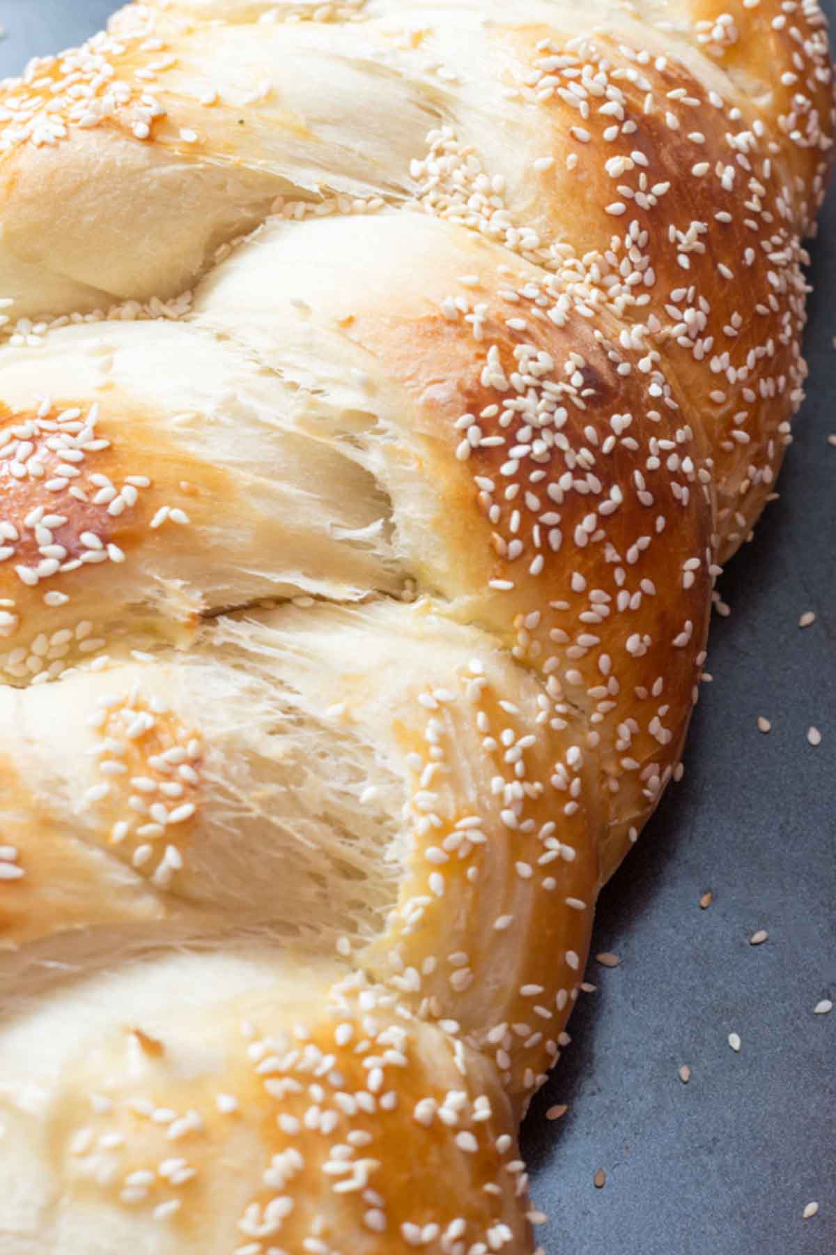 braided challah bread with sesame seeds