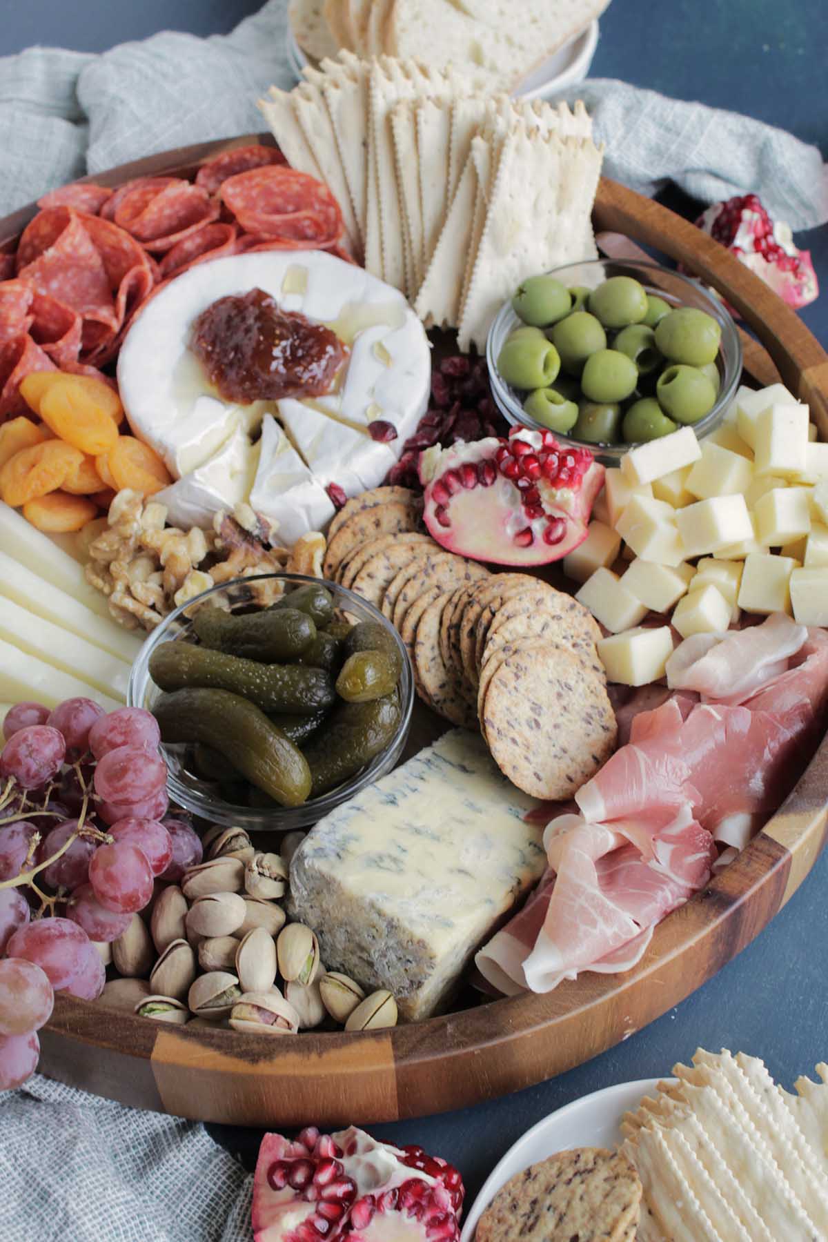 fall charcuterie board with cheese, meat, and crackers.