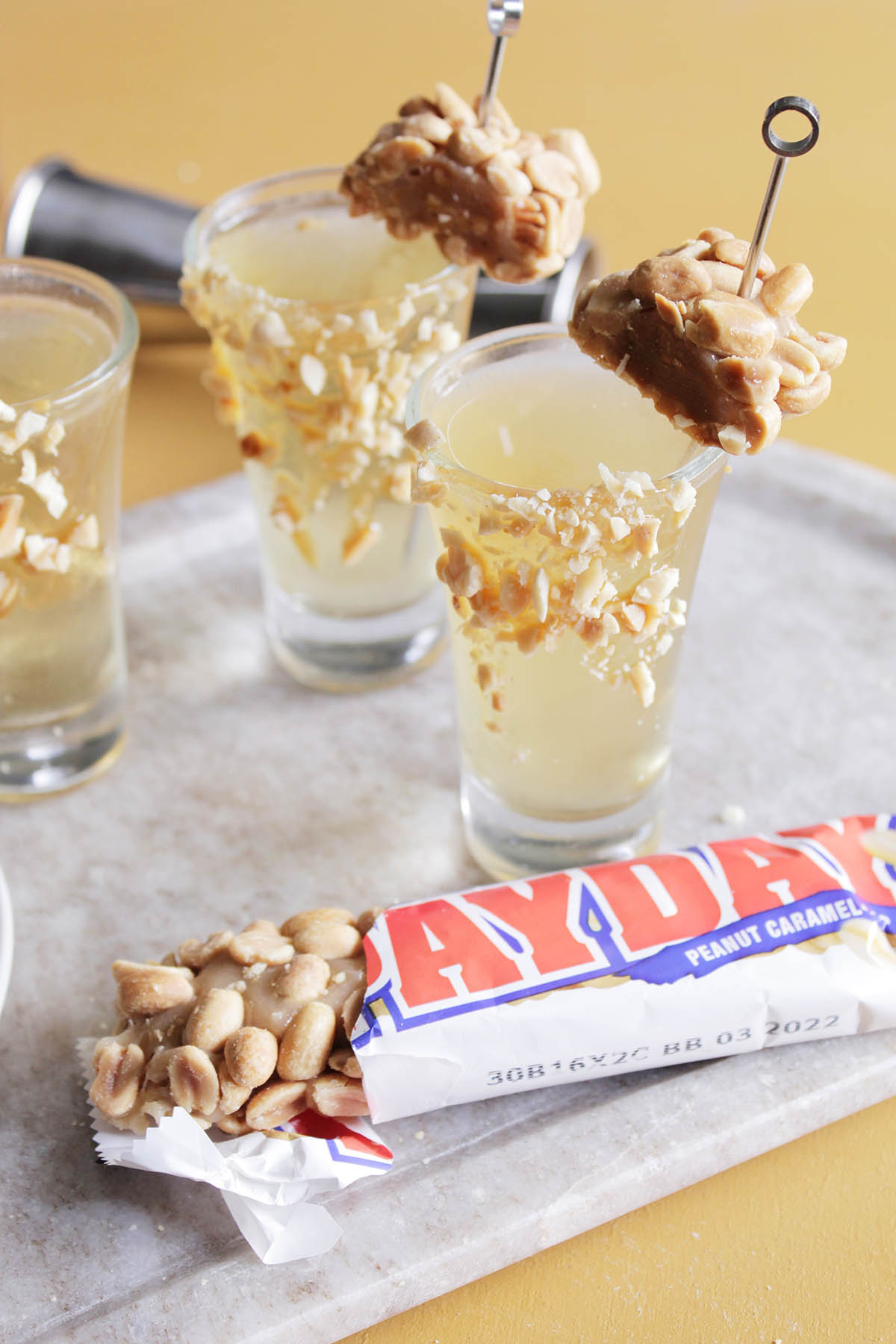 payday candy bar in shot glass.