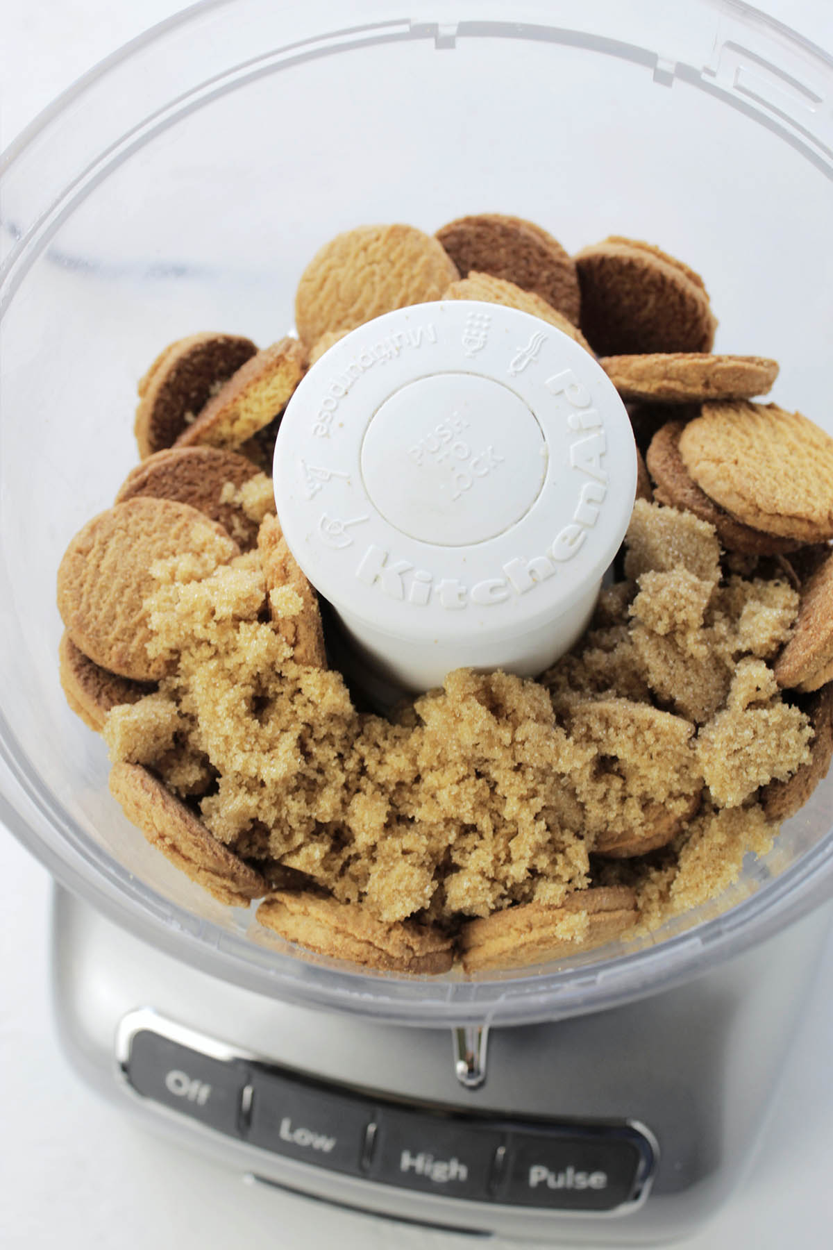 gingersnap cookies and brown sugar in food processor