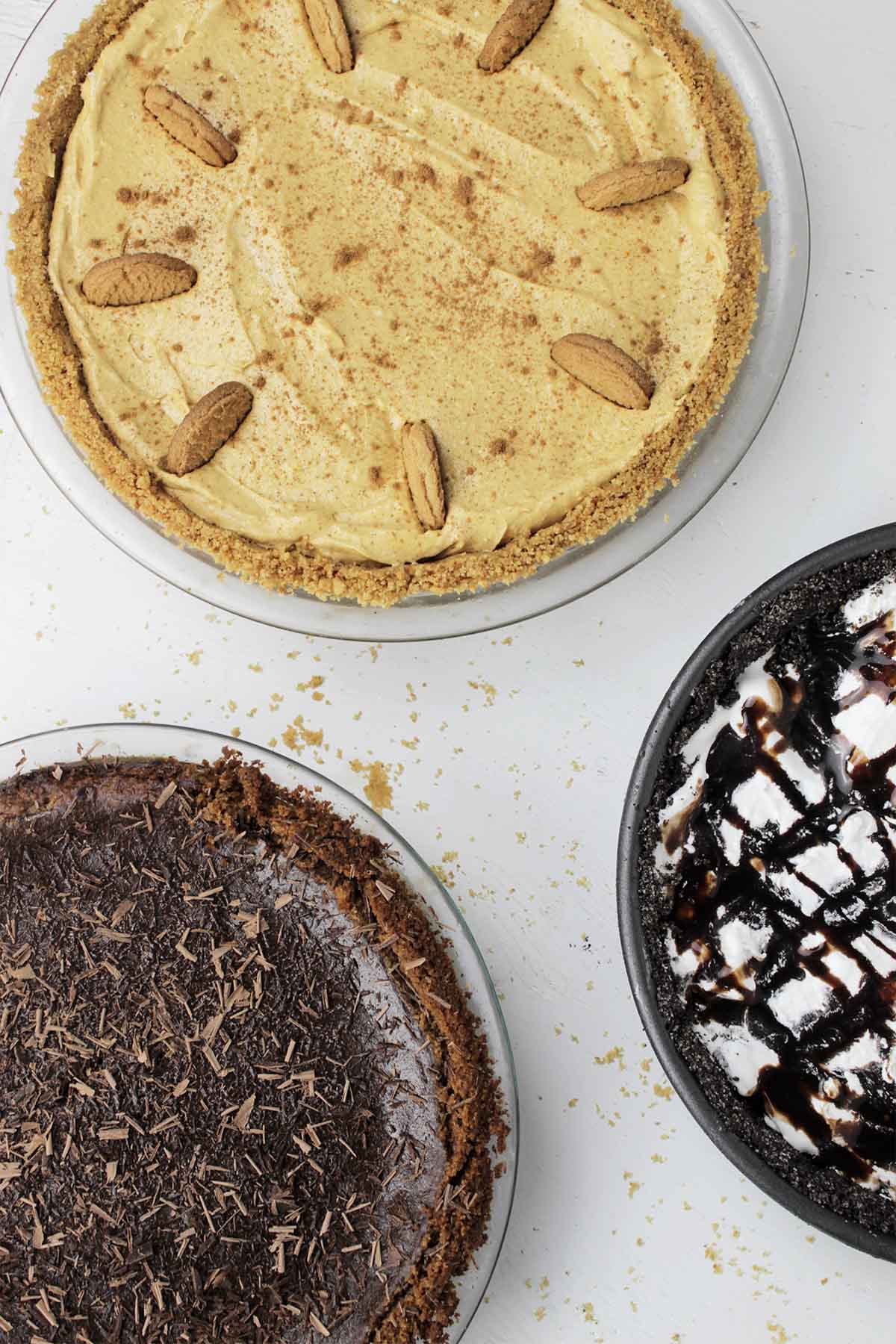 three types of pie with crumb crust