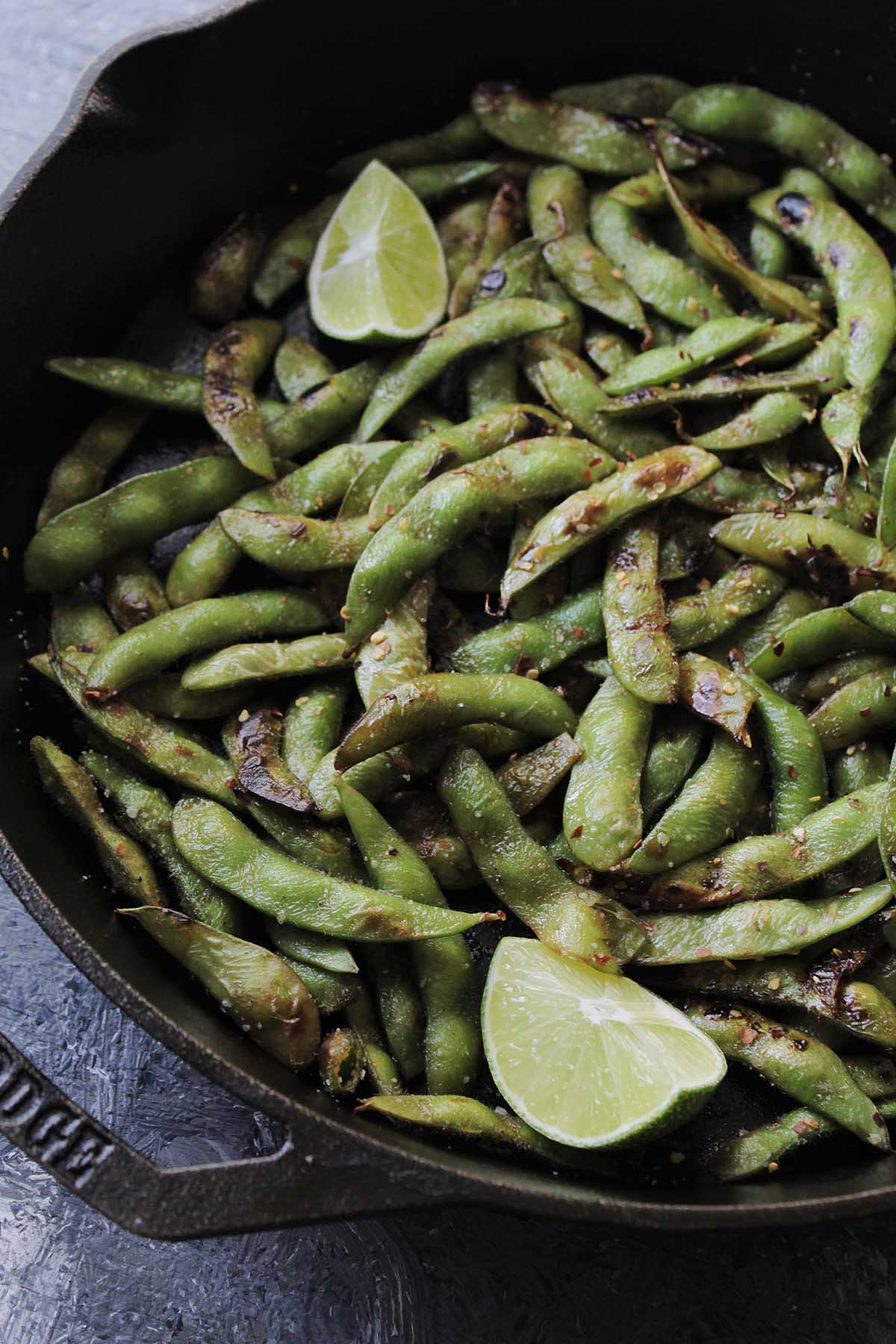 edamame pods cooked in cast iron skillet