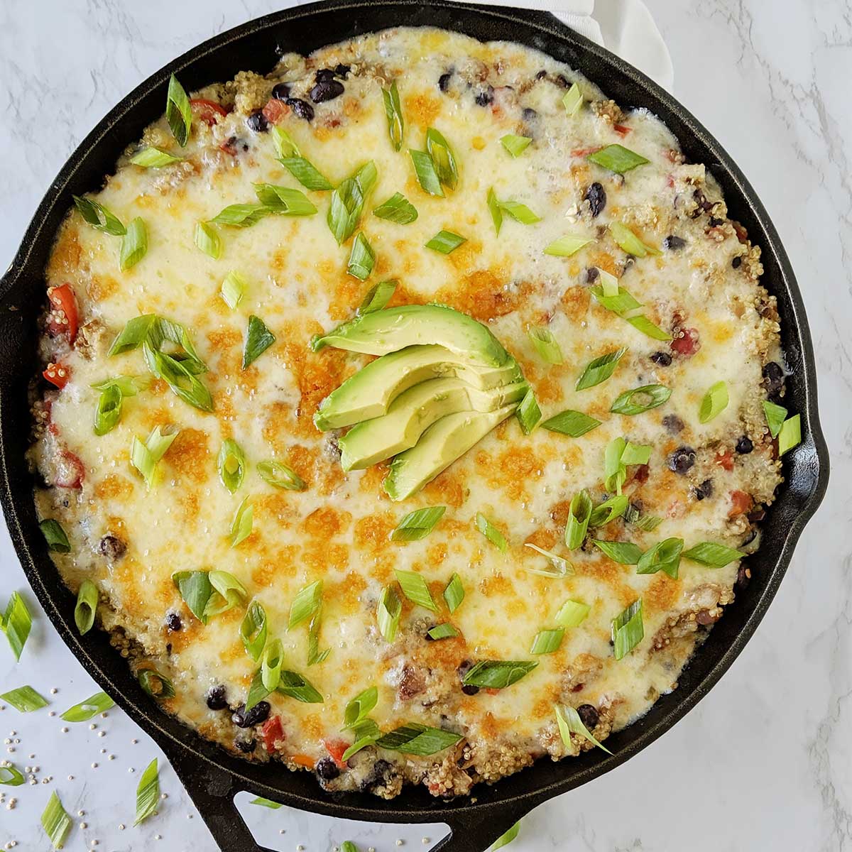 Mexican quinoa bake in cast iron skillet.