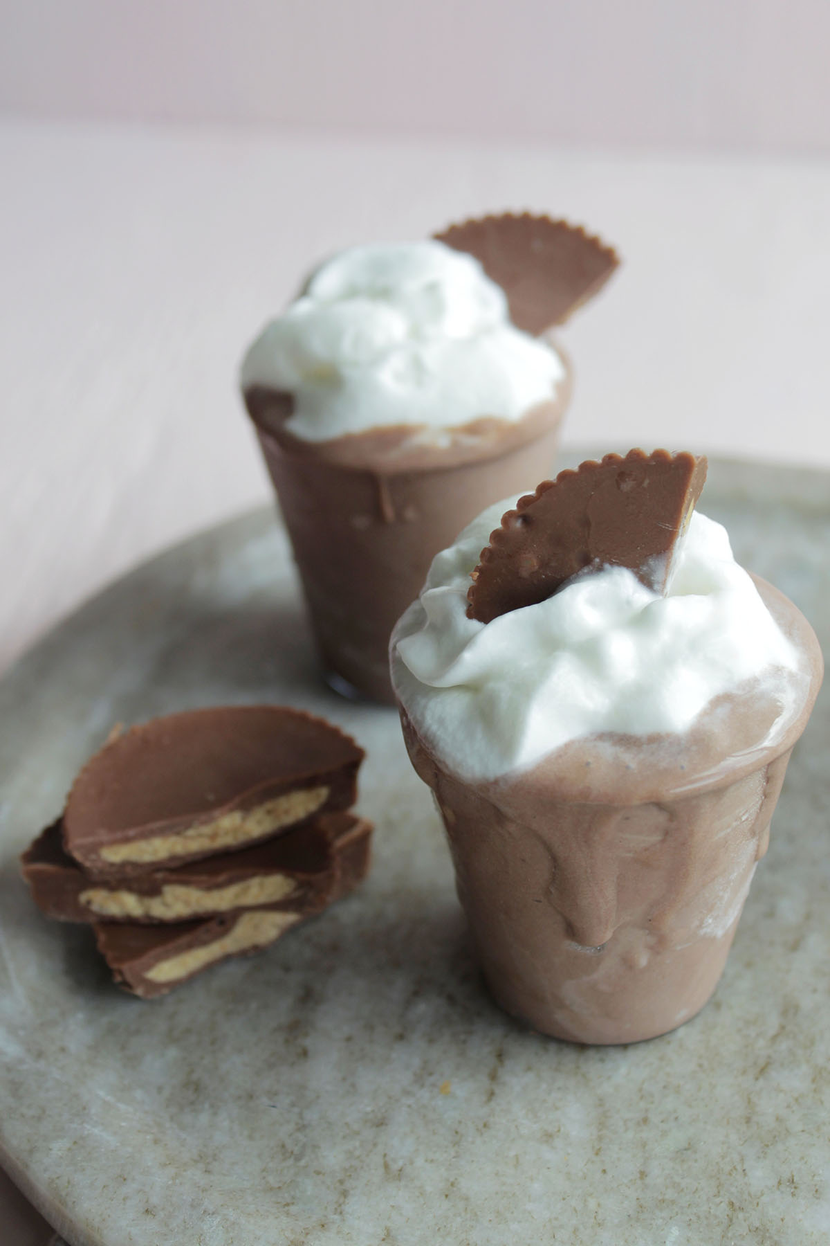 peanut butter whiskey pudding shots with Reese's garnish