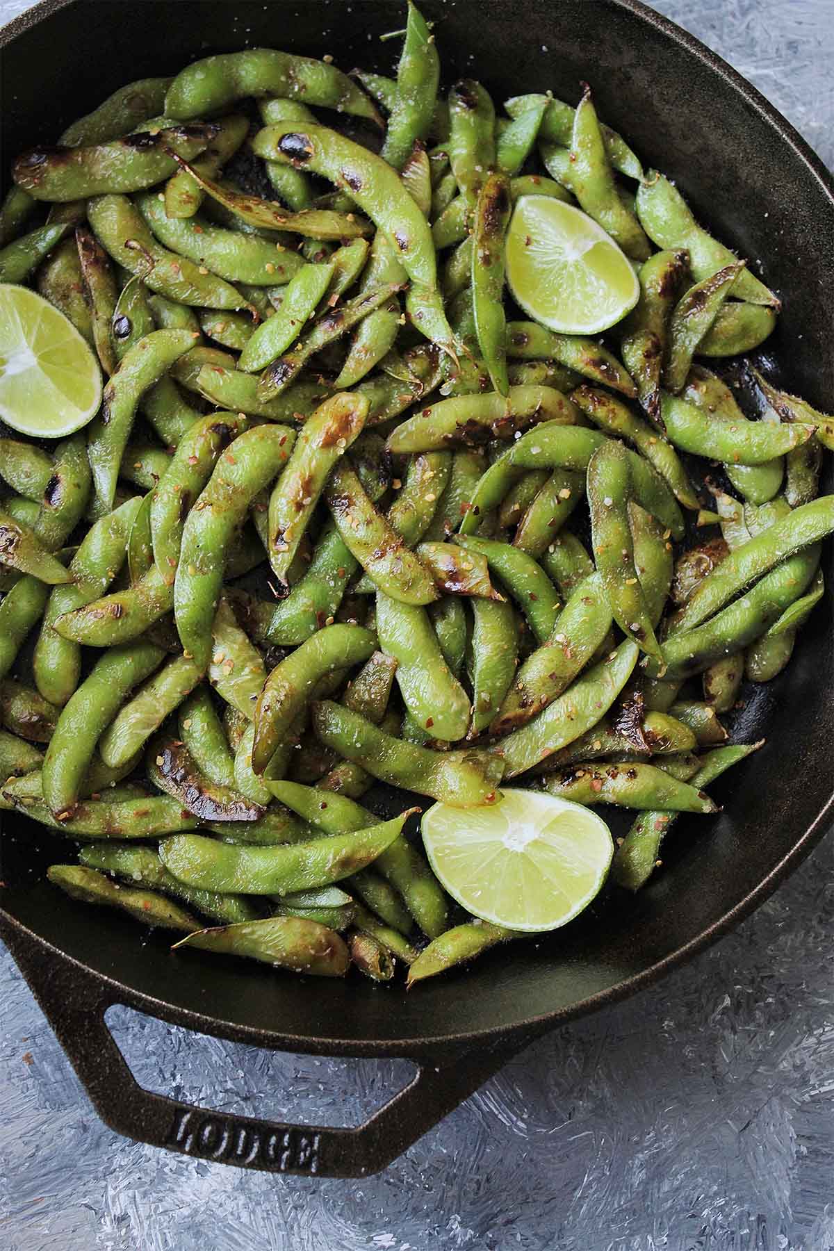 blistered pan fried edamame in cast iron