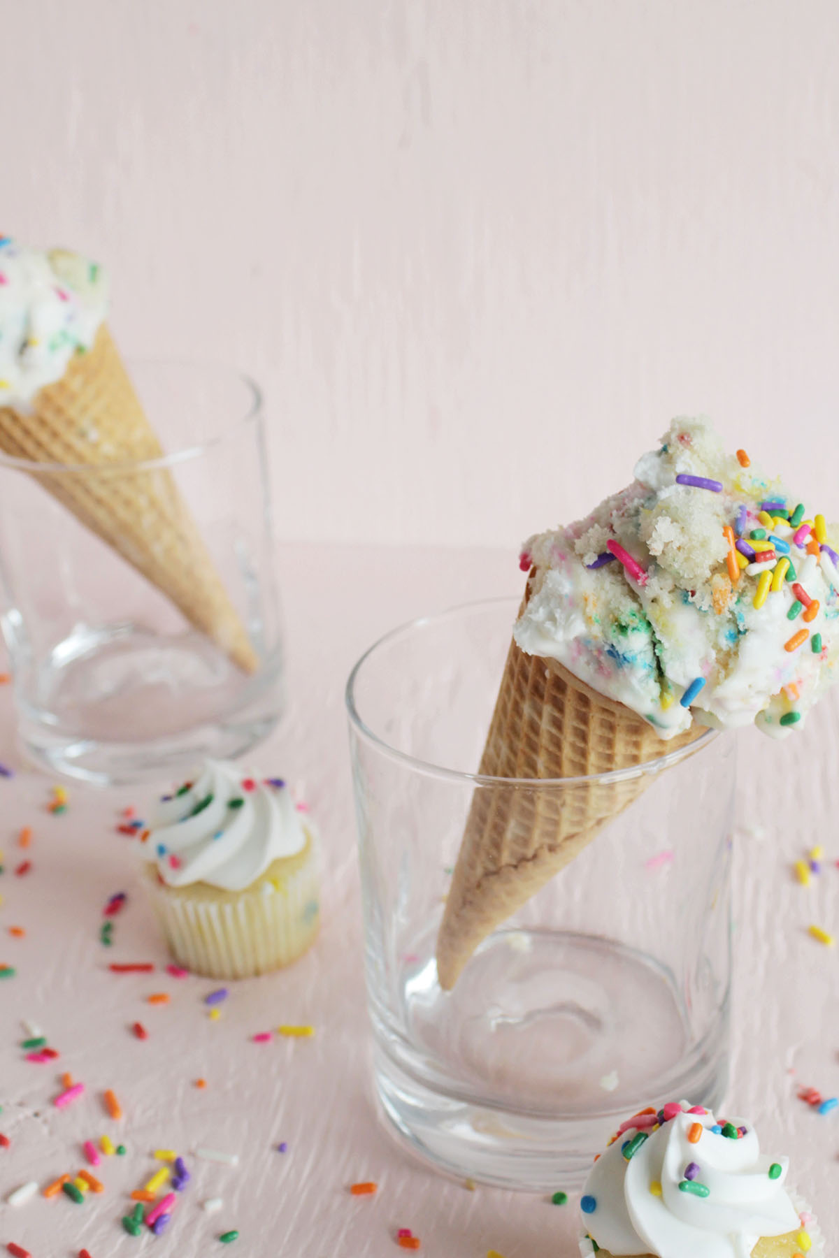 cake batter ice cream in cones with cupcakes
