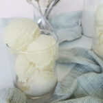 vanilla ice cream scoops in clear glass.