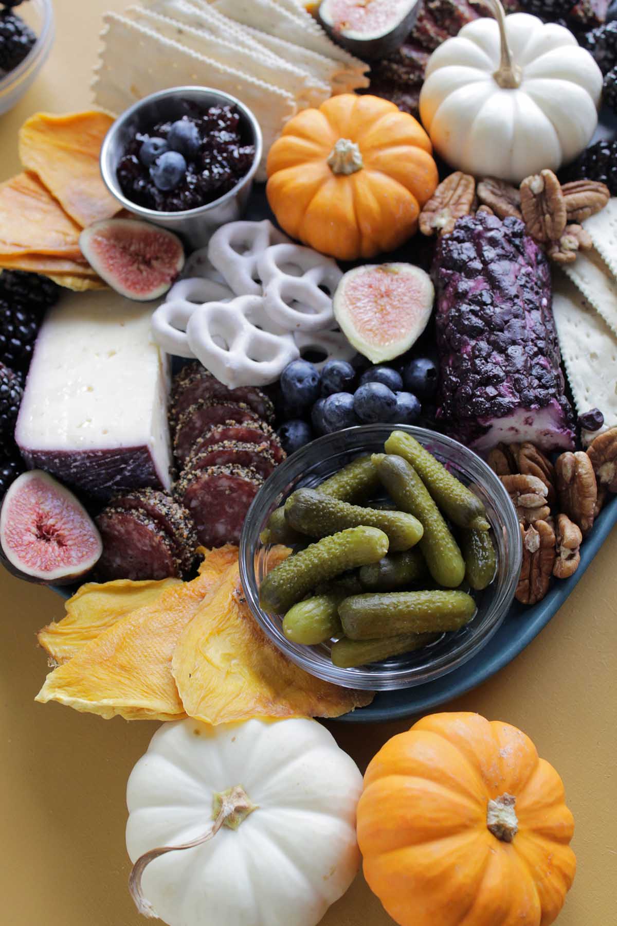 charcuterie board with various food ingredients