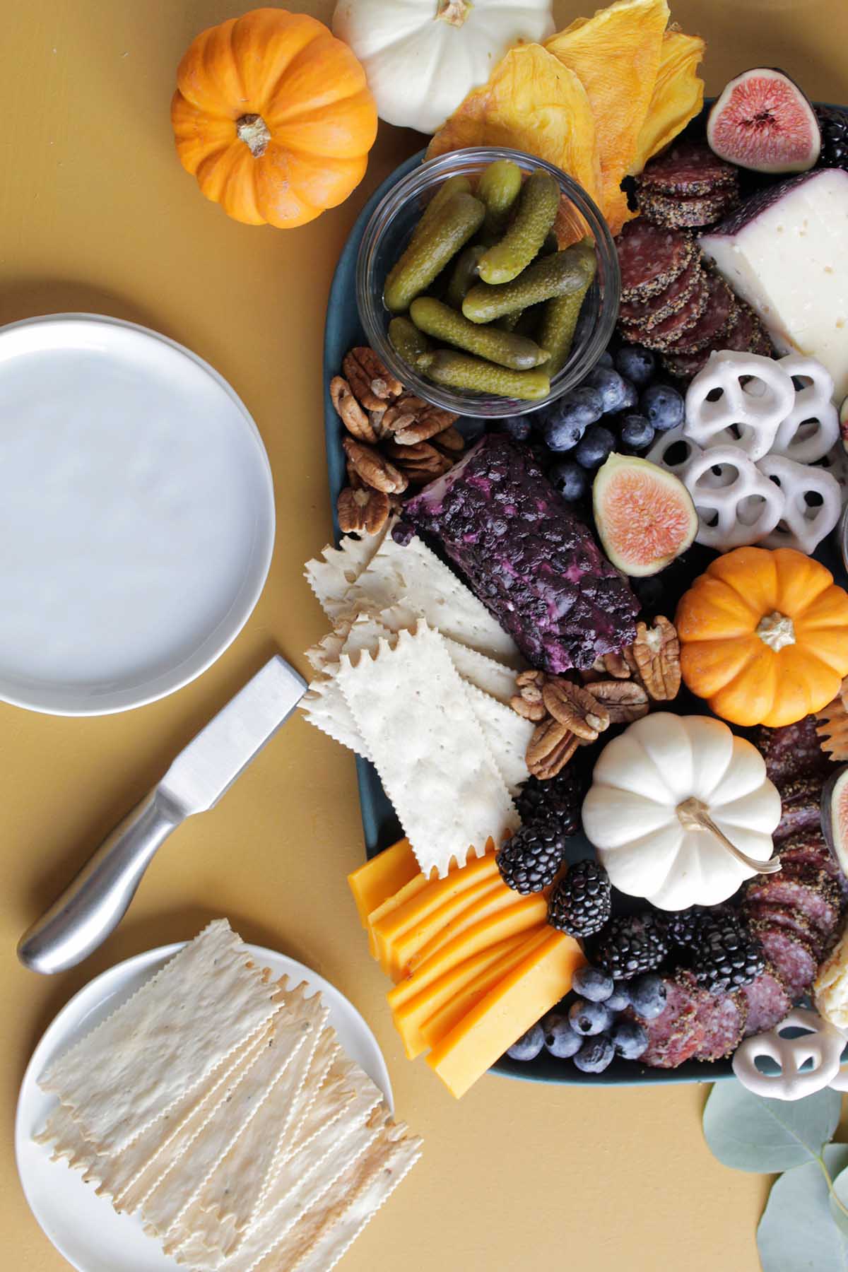 cheese board next to mini plates