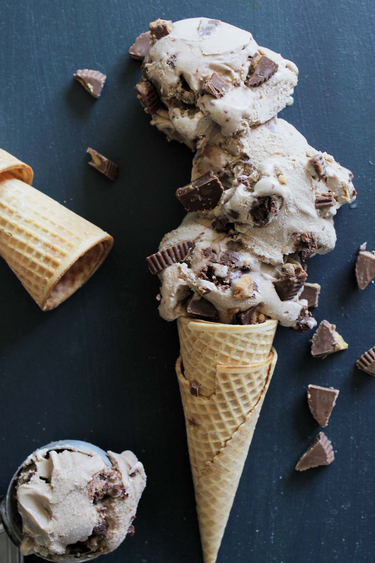 moose tracks ice cream in waffle cone and on ice cream scoop.