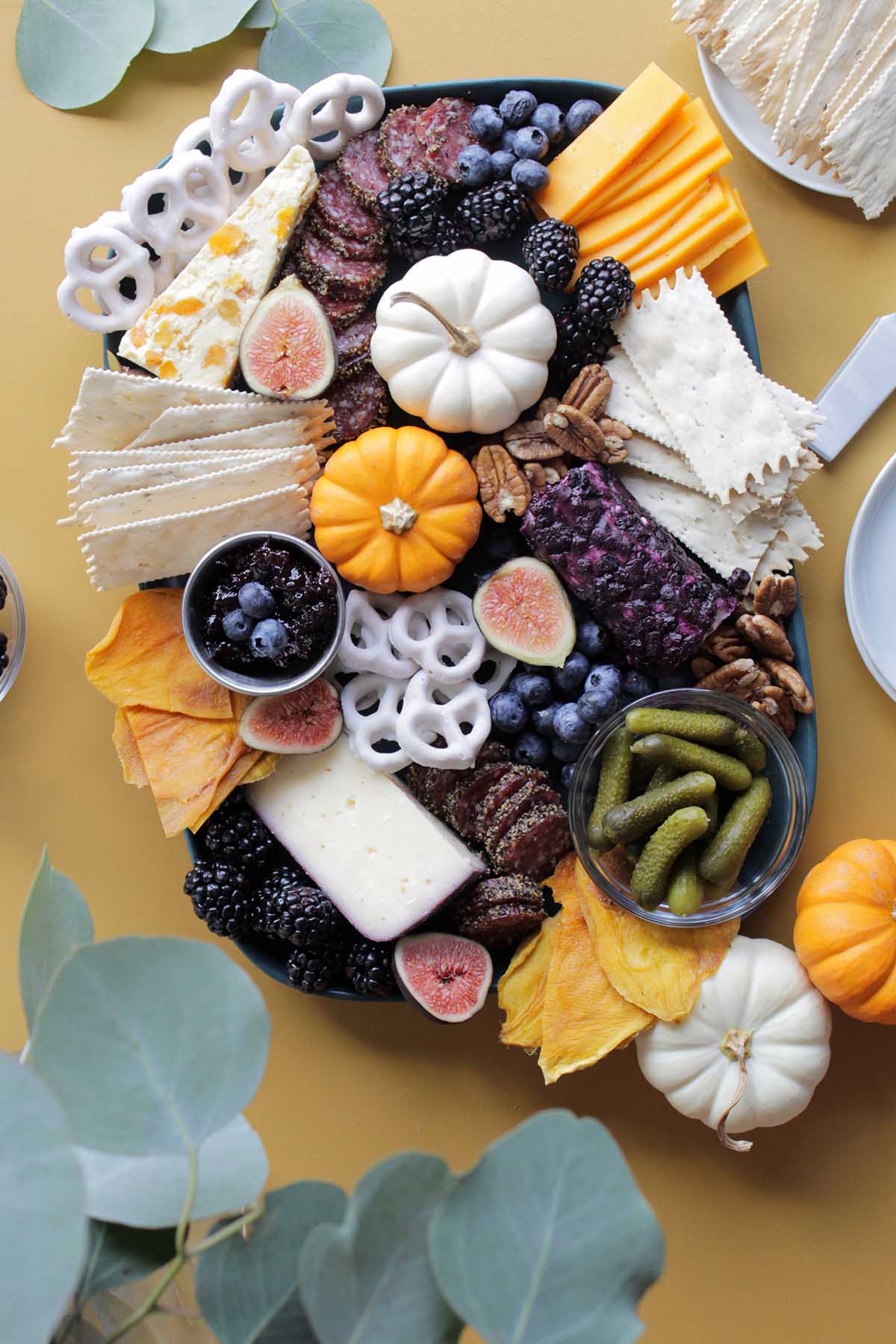 fall cheese board on blue platter