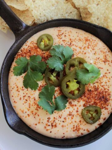 spicy queso with jalapeno topping.