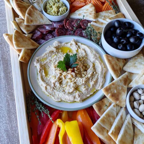 greek appetizer platter with hummus.