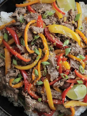 stir fry with thinly sliced beef and bell peppers.