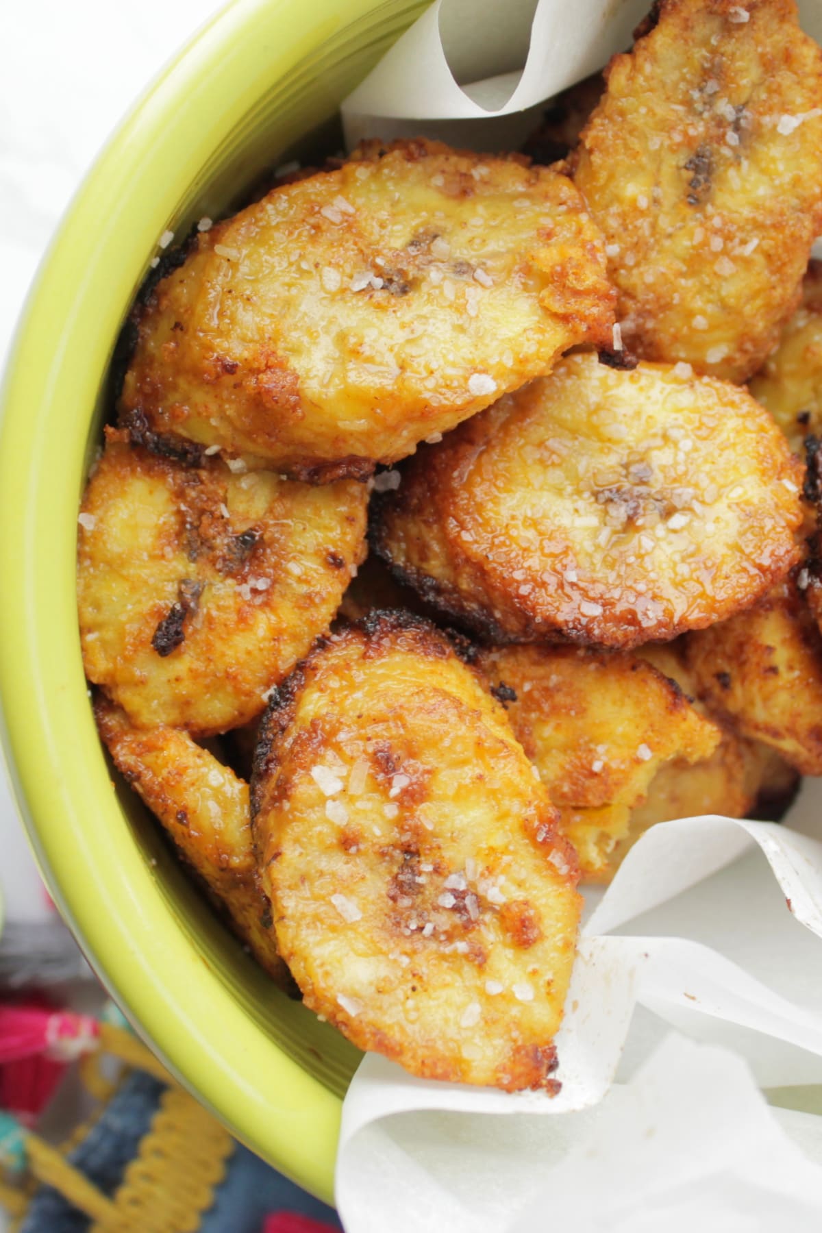 salted air fried sweet plantains in bowl.