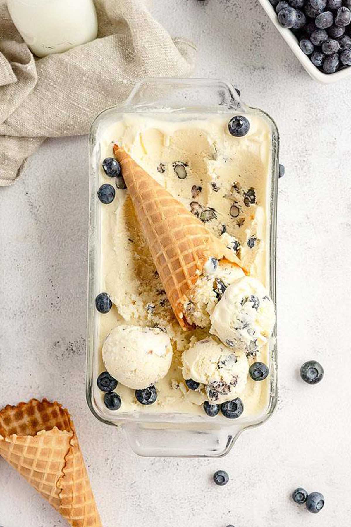 blueberry cheesecake ice cream in a loaf pan.