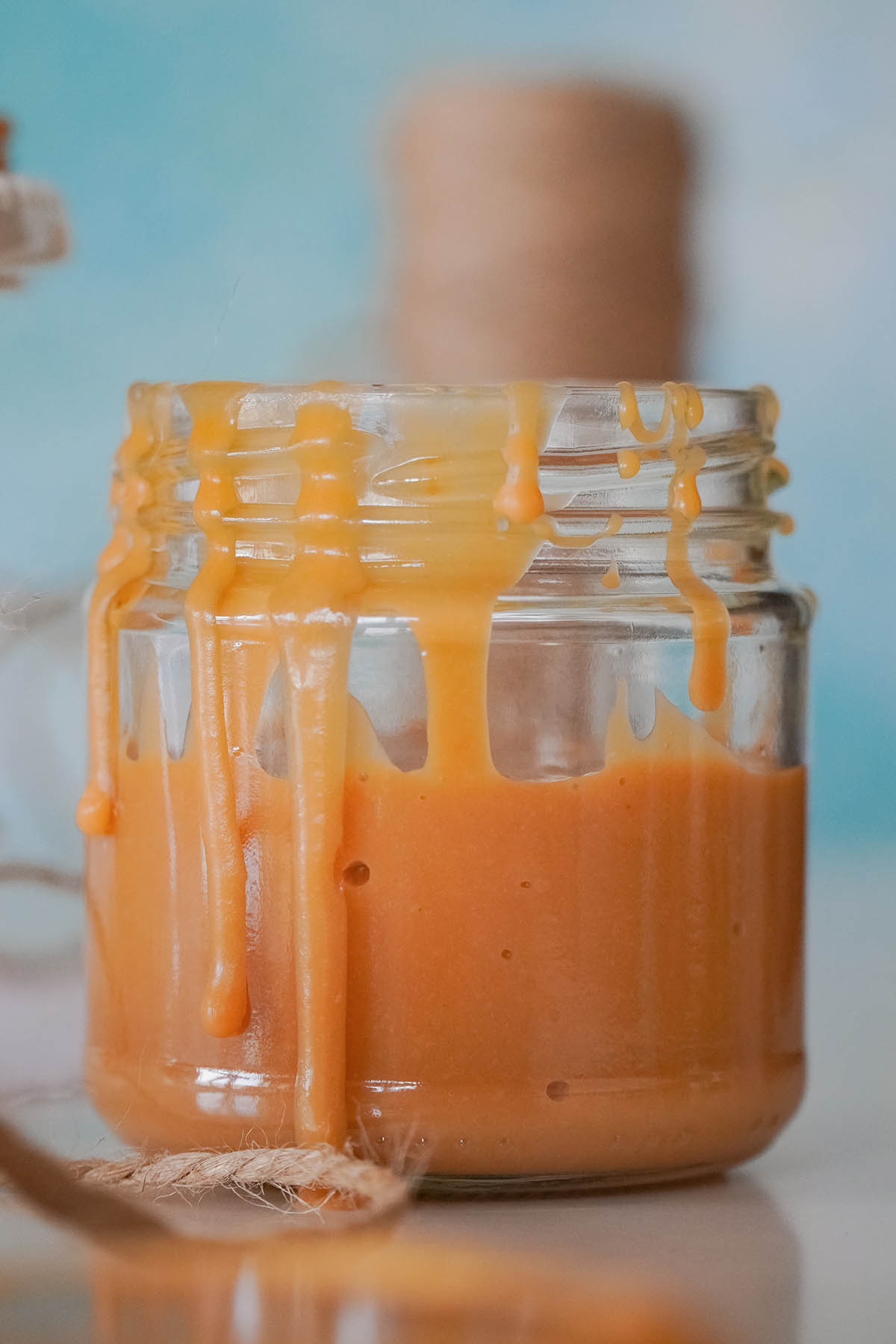 dulce de leche in a glass jar.