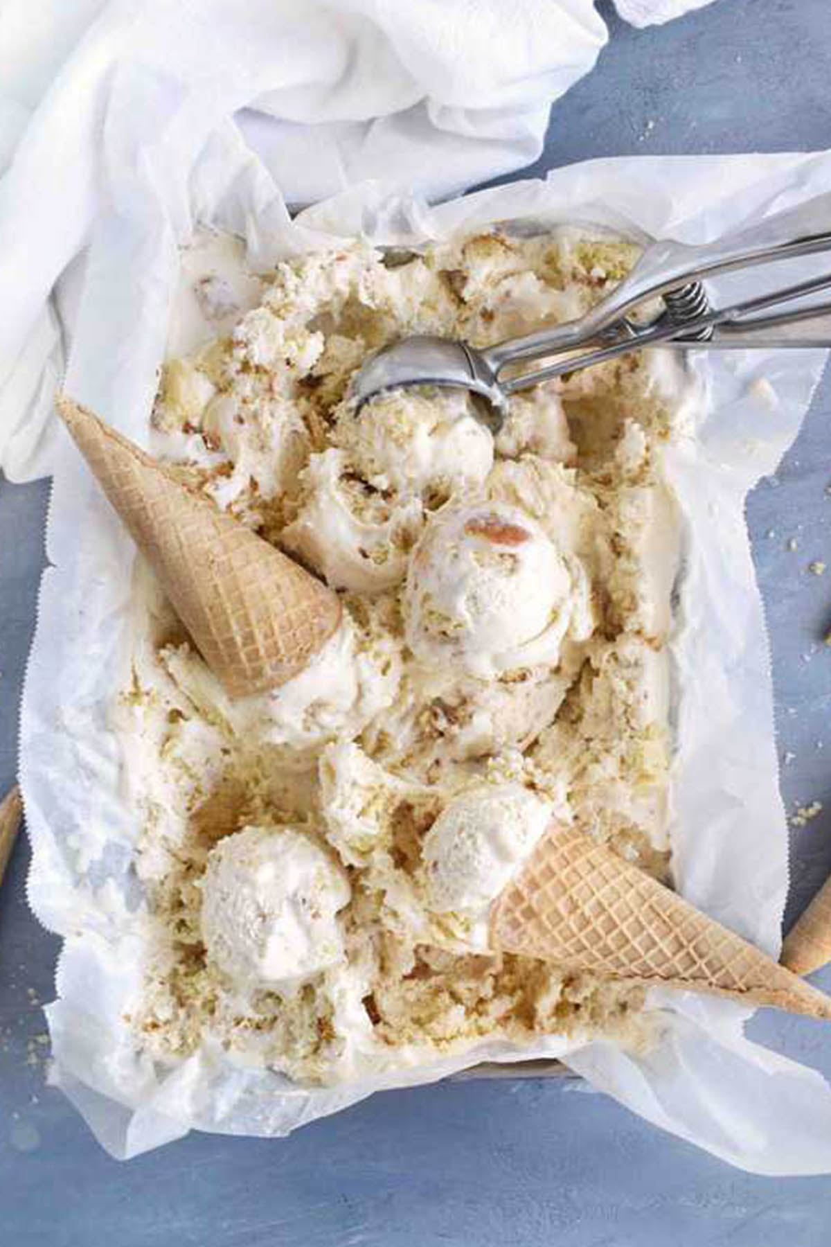 gooey butter cake ice cream with ice cream scoop.