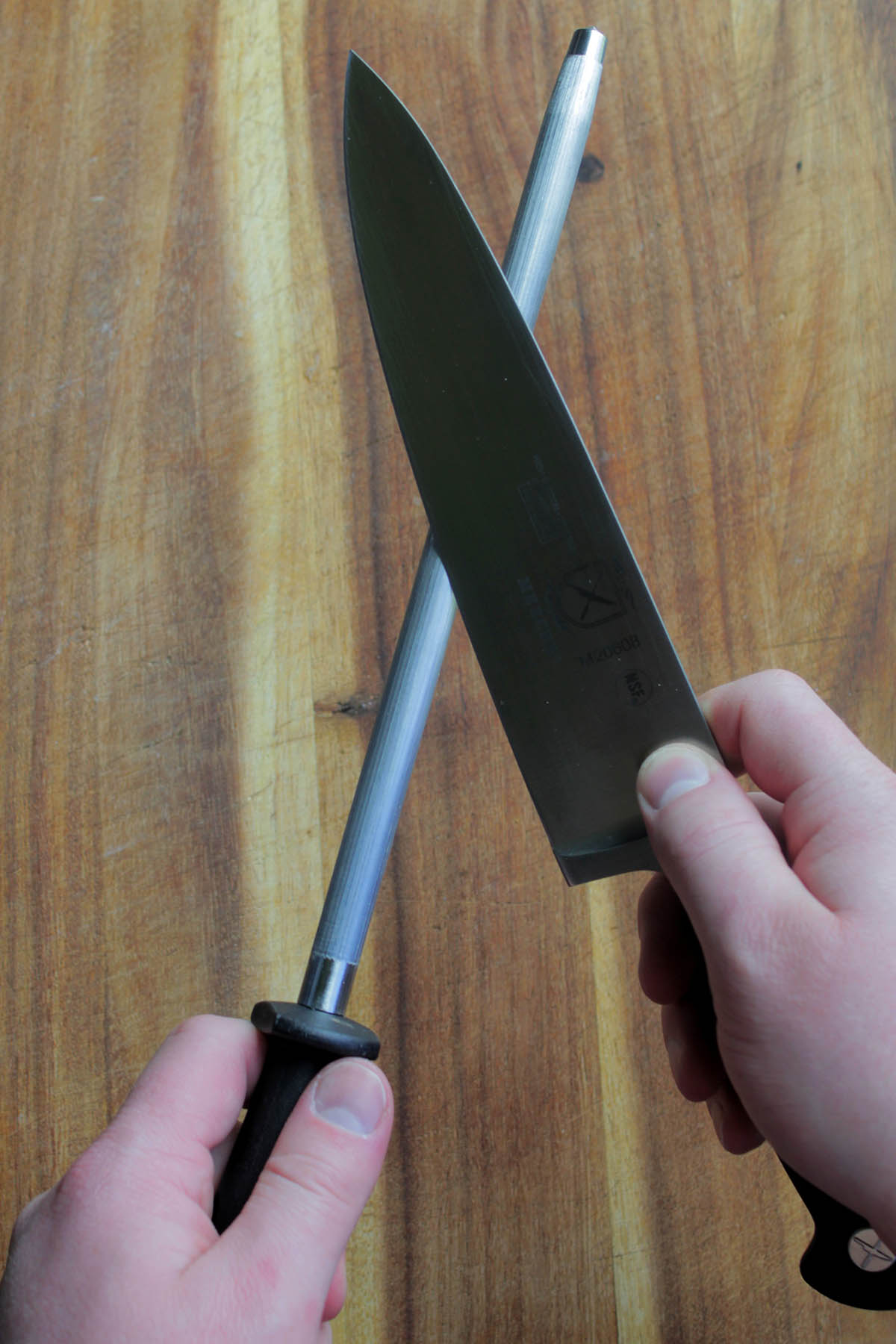 using a honing steel with a chef's knife.