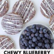 Pinterest image of blueberry cookies drizzled with white chocolate.