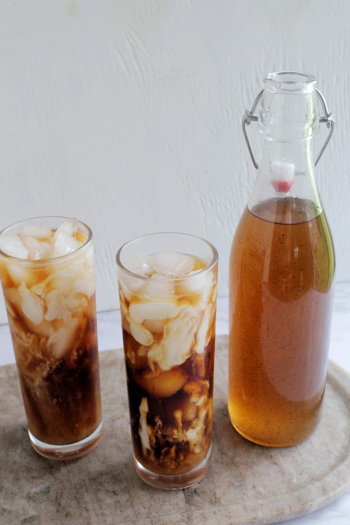 vanilla coffee syrup next to cold brew coffee.