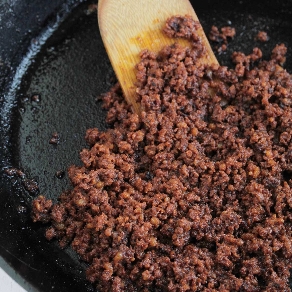 cooked Mexican chorizo in a cast iron skillet.