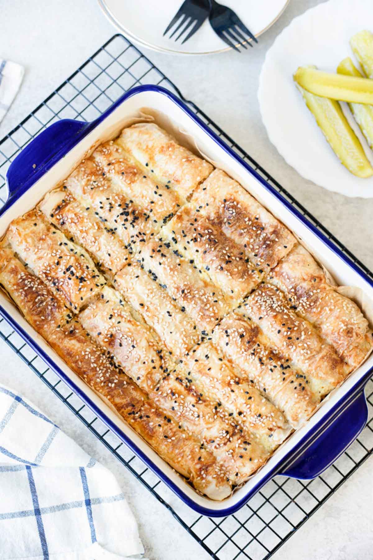 phyllo dough pie topped with sesame seeds.