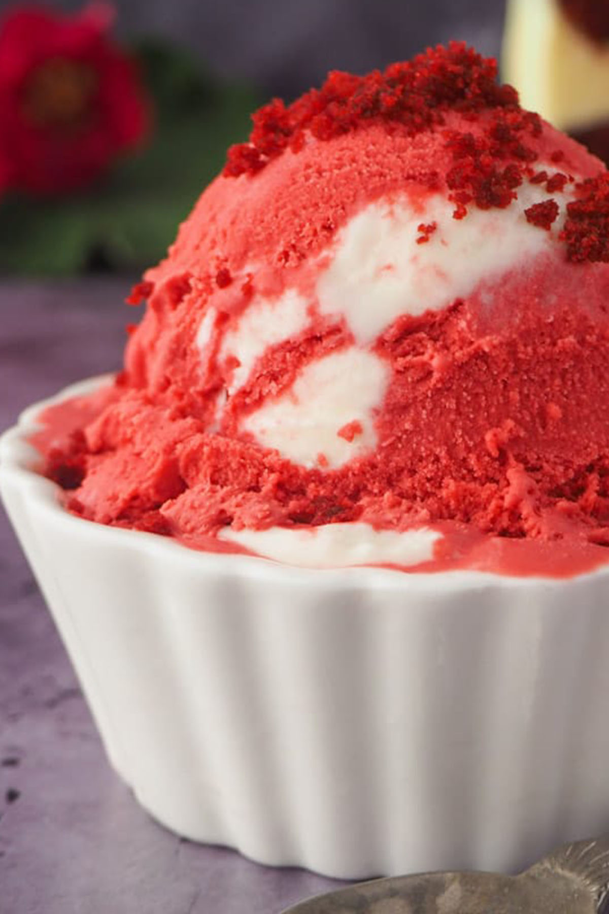 serving bowl holding red velvet ice cream.