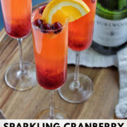 sparkling cranberry champagne and tequila cocktail Pinterest pin.
