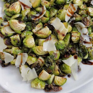 roasted brussel sprouts topped with balsamic glaze and parmesan cheese.