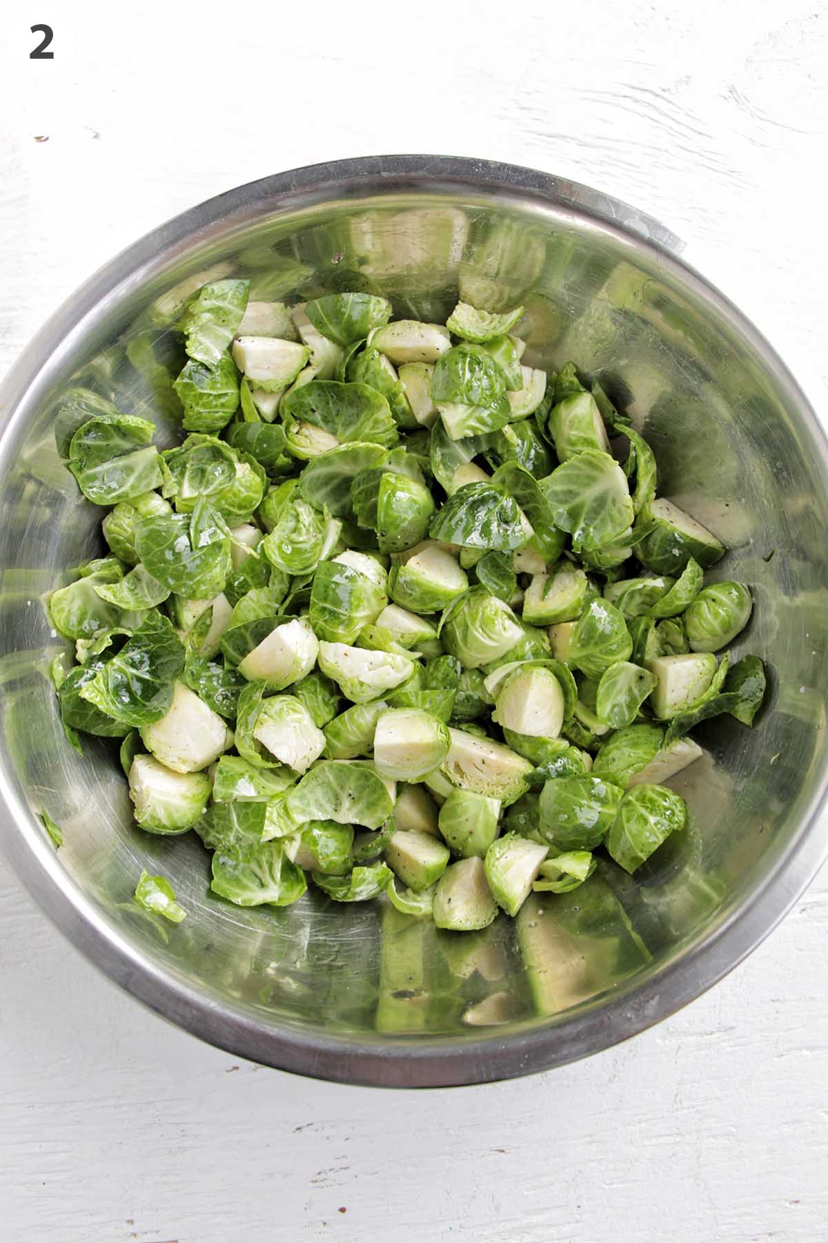 numbered photo showing brussel sprouts in a mixing bowl.