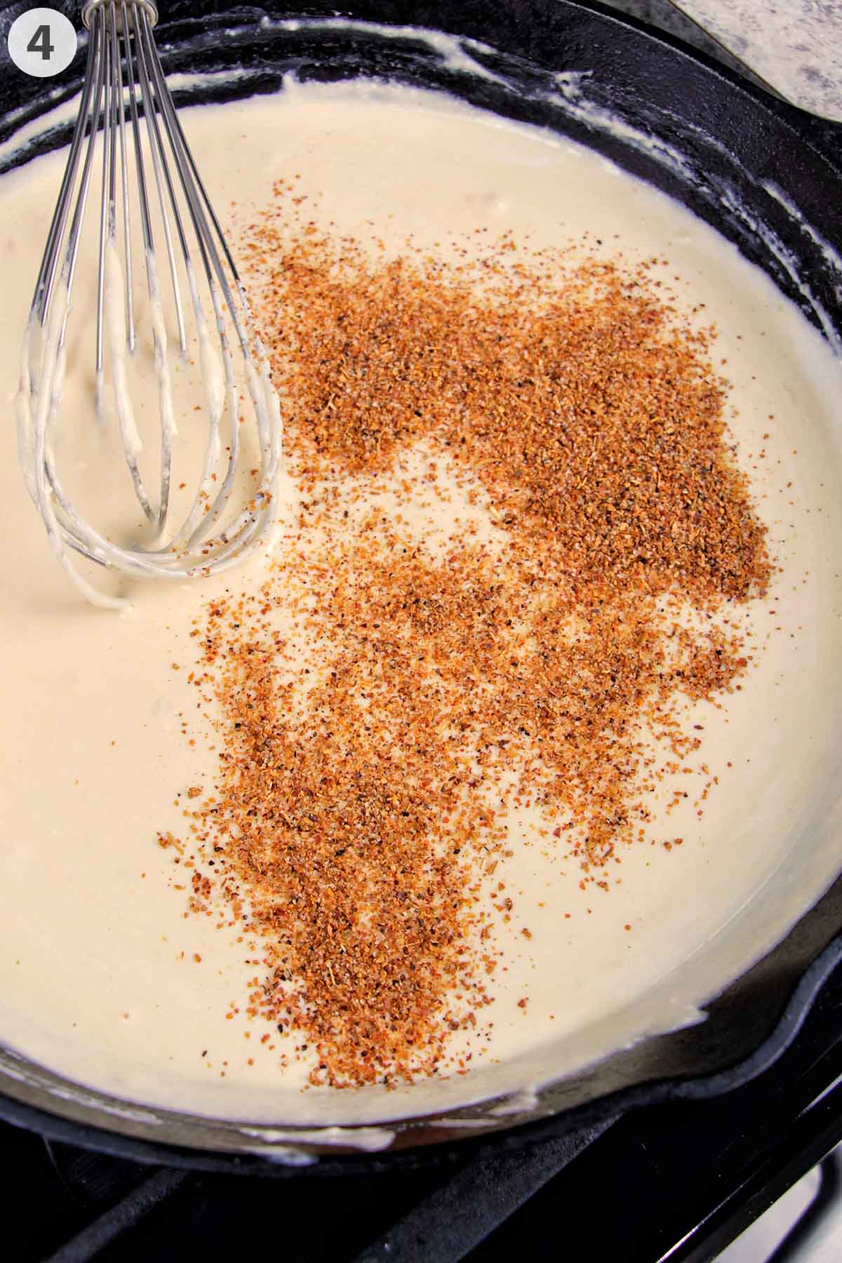 numbered photo showing how to mix tajin seasoning into queso.