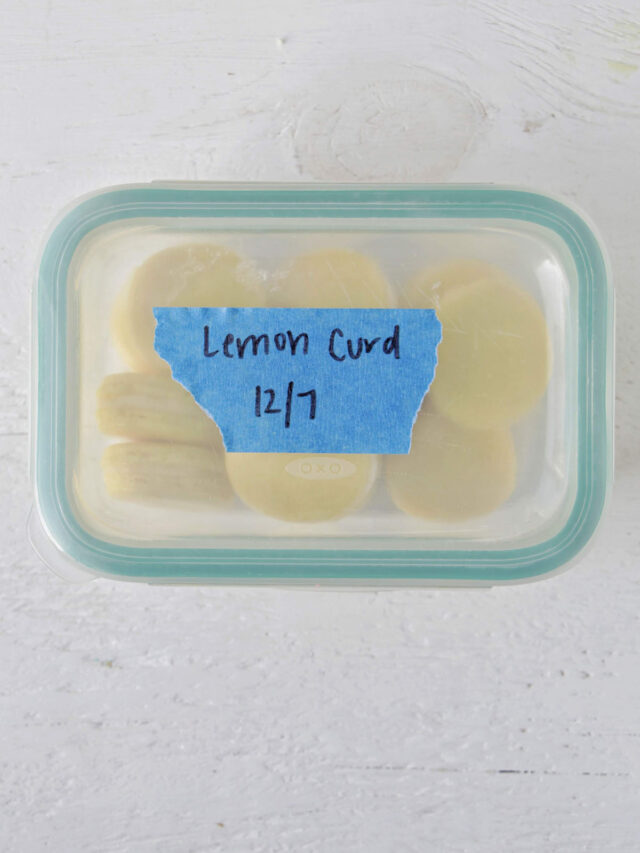 lemon curd macarons in an airtight storage container.
