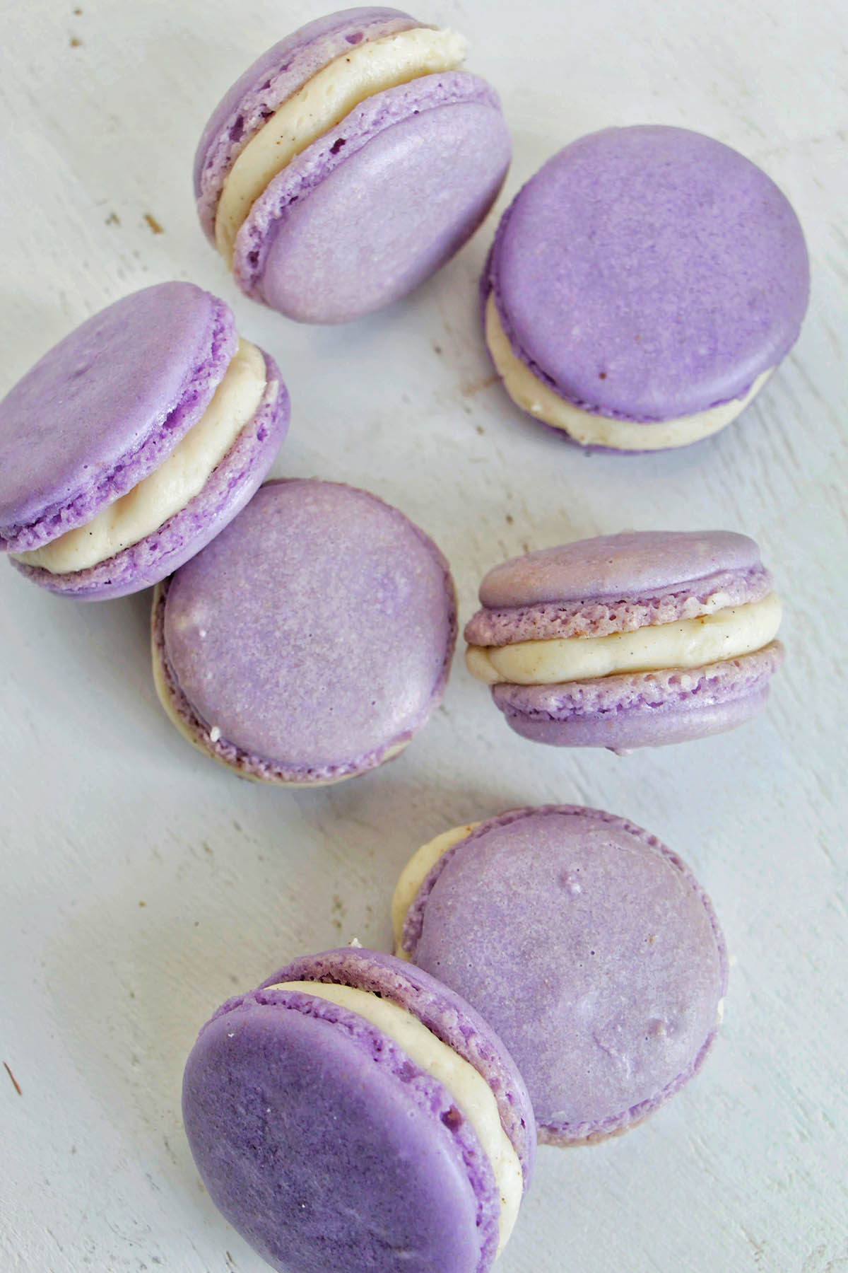 purple macarons filled with vanilla buttercream filling.