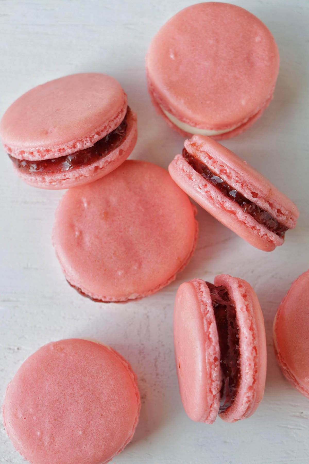 pink macarons filled with strawberry jam.