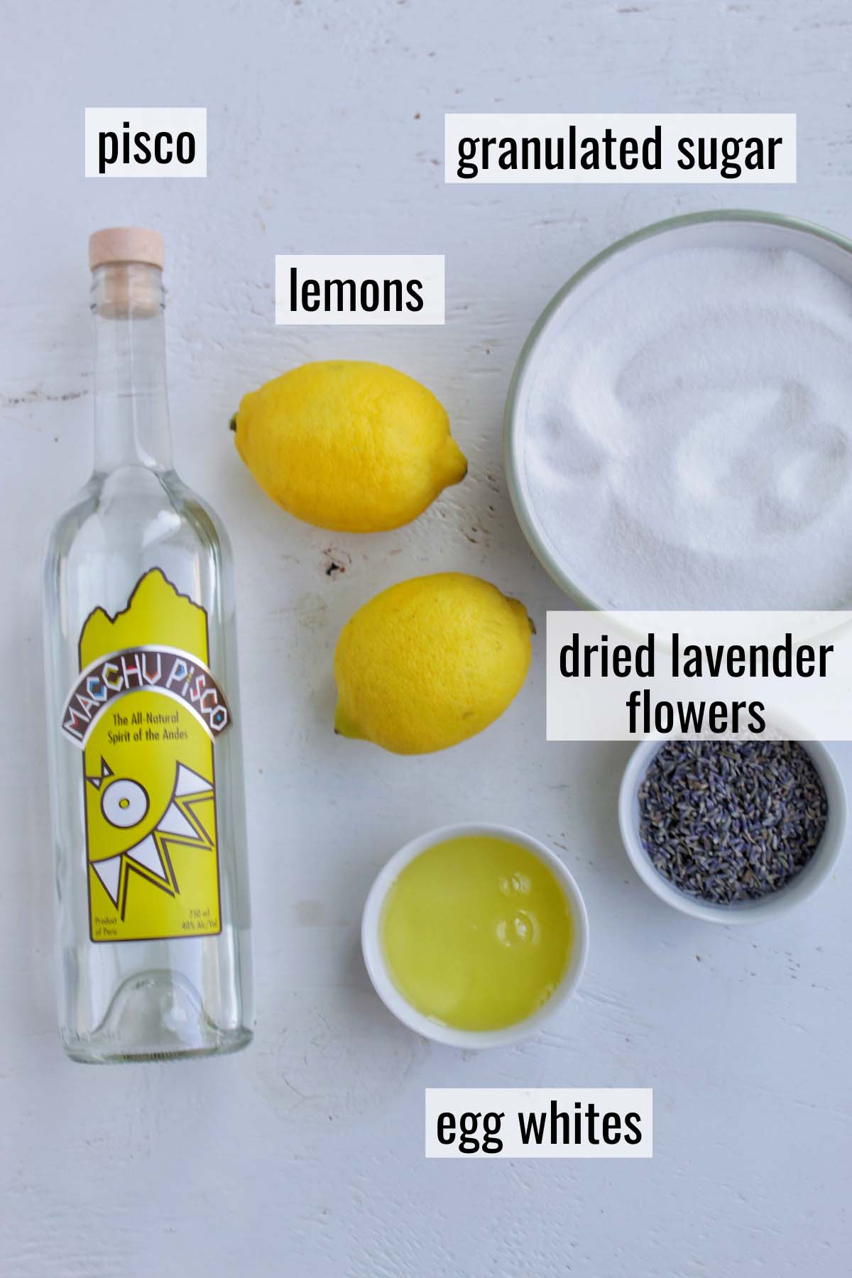 lemon pisco sour ingredients with labels.