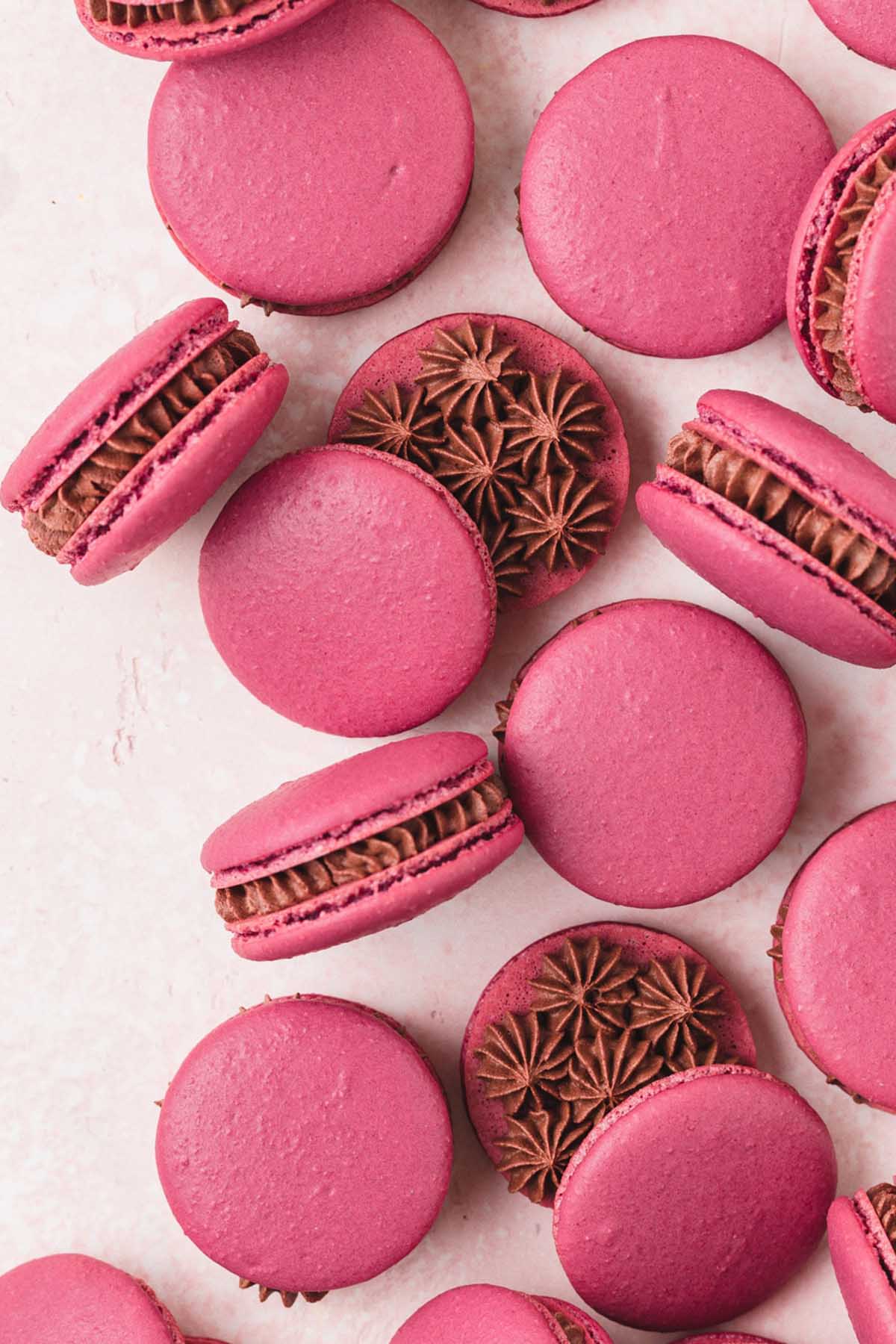 pink red wine flavored macarons with chocolate filling.
