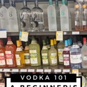 various vodka bottles on a store shelf.