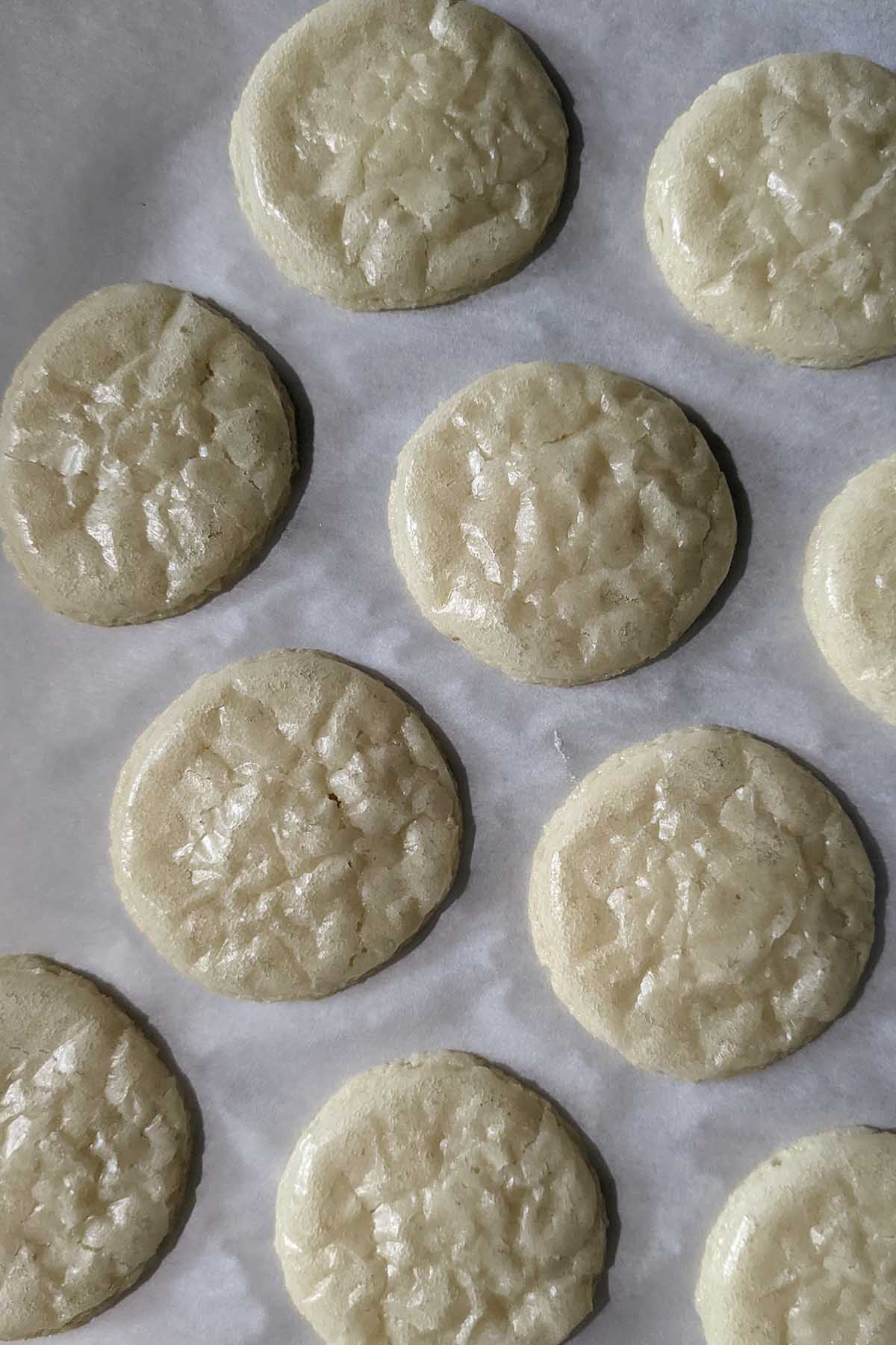 white colored wrinkly macaron shells.